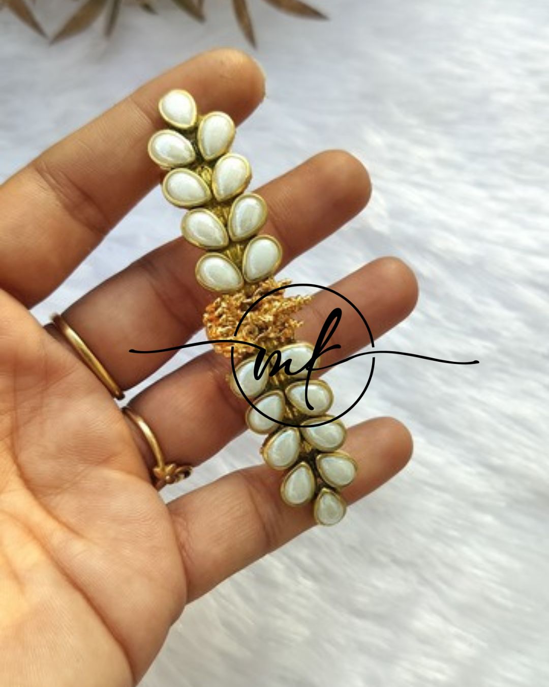 Lakshmi White Center clip