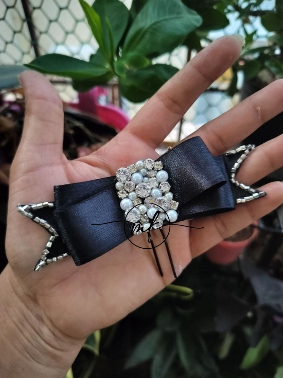 ROHI black bow hair Brooch