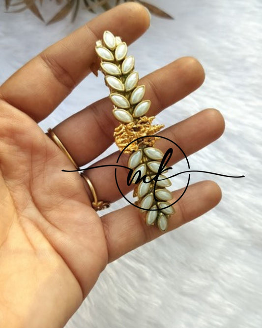 Lakshmi White Center clip